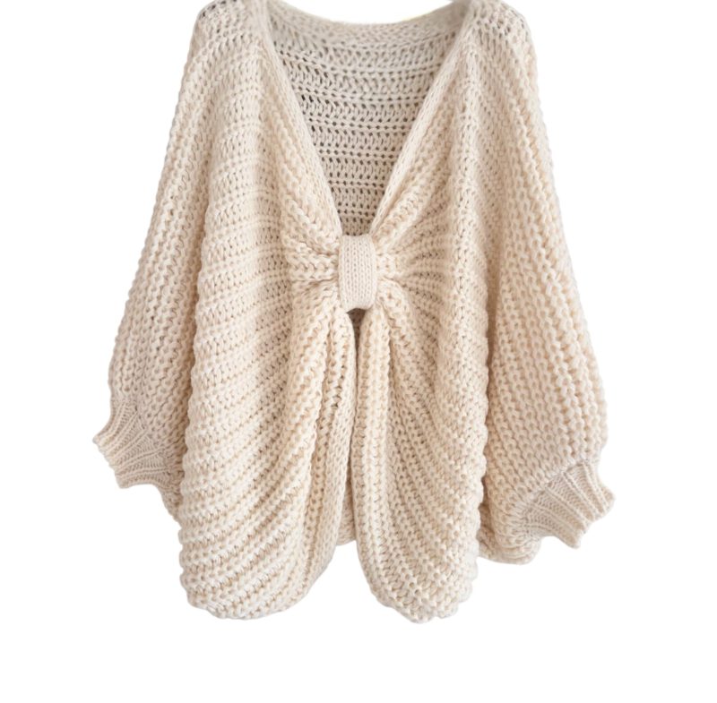 Poncho trui creme